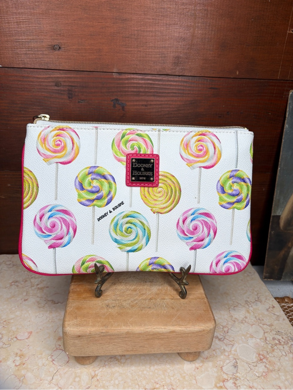 Dooney & Bourke White Lollipop Print Leather Wristlet with Pink Trim & Tassel